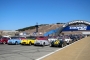 Healeys under the Cooper Tire Bridge at Laguna Seca
